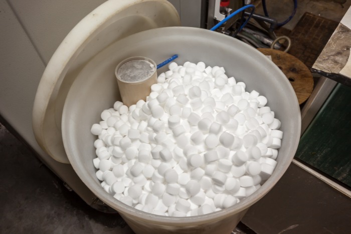 Salt tablets used for reducing water hardness in a water softener system
