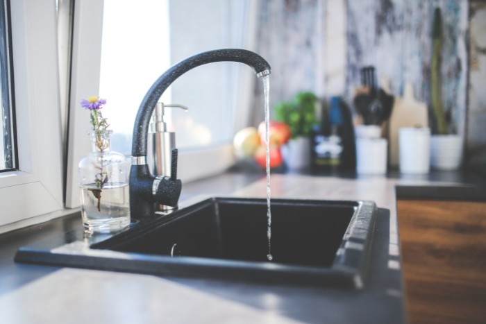 Faucet showing reduced water flow due to water softener issues