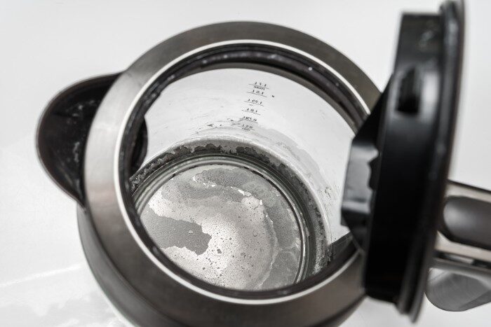 Mineral deposits in kettle highlighting the need for water softeners