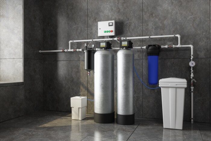 Whole-house water softening system with dual tanks, designed to remove hard water minerals.