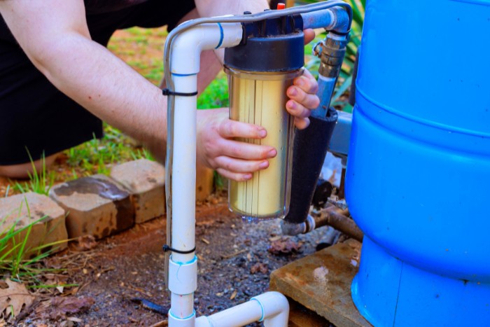 Pre-filtration system removing dirt and sand from well water supply in AZ