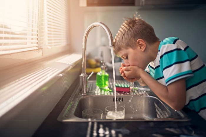 Child drinking RO water